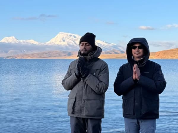 Praying At Lake Manasarovar